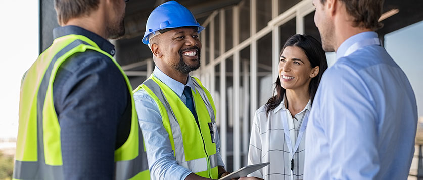 Engineer talking to a client.