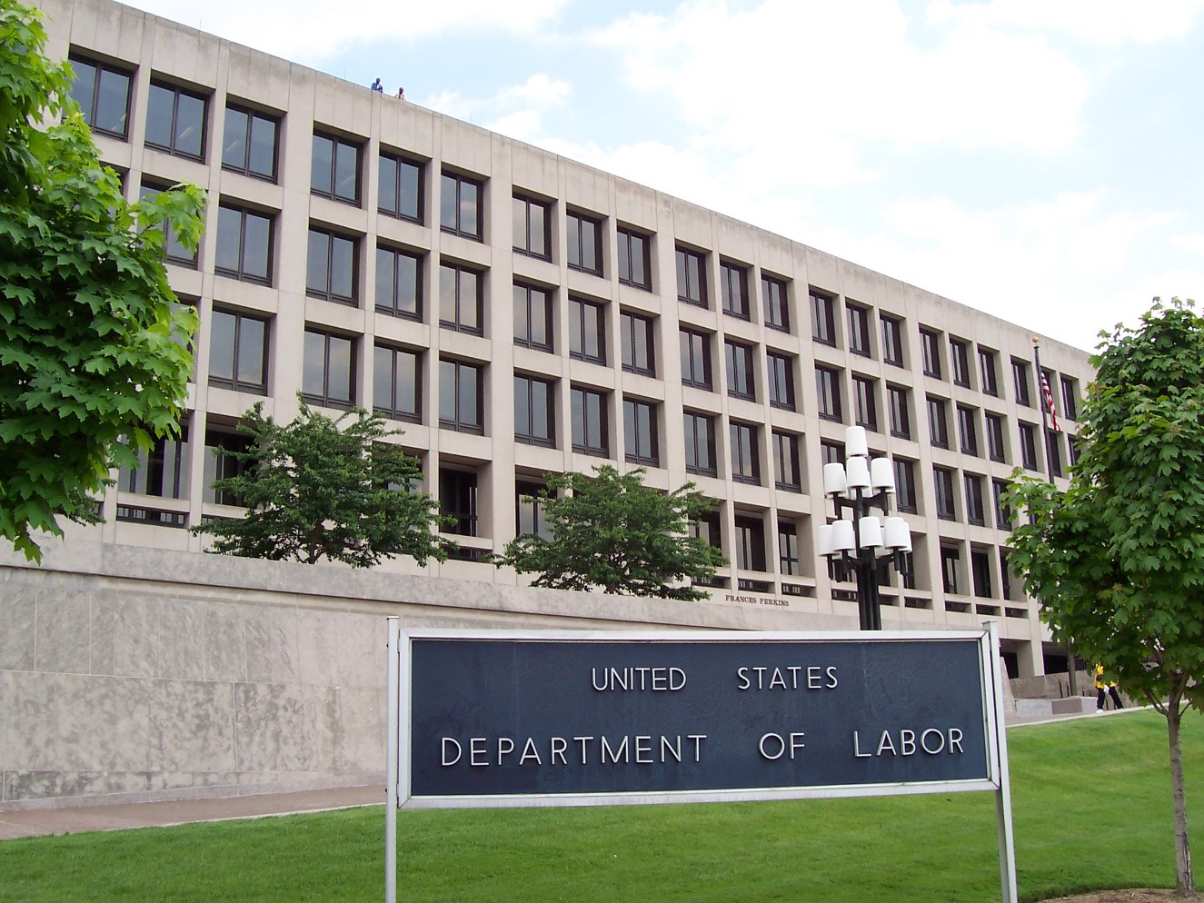 An outside portrait of the United States Department of Labor in the middle of the day.