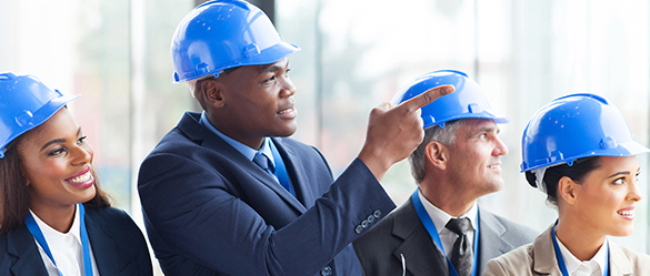 Engineer showing his client the construction site.