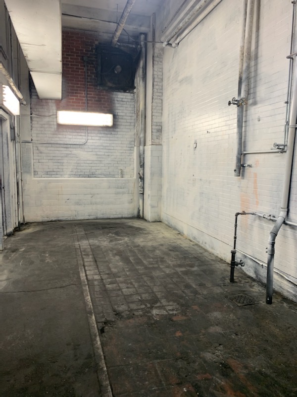 Empty Older Warehouse / Industrial Space with White Walls